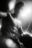 AI-generated portrait of a boxer in gloves, posed against a red industrial wall — blending raw physicality with Midjourney fashion aesthetics
